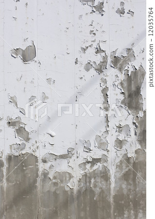 Concrete wall where paint peeled off 12035764