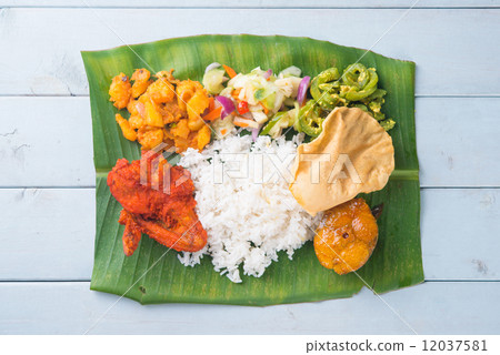 Indian banana leaf rice on table 12037581