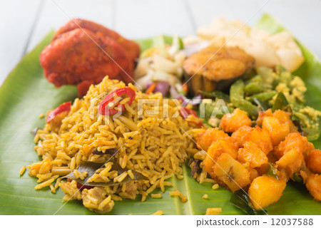 Indian biryani rice on banana leaf. 12037588