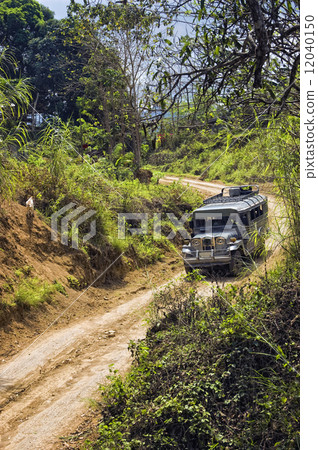 Jeep on Dirt Road Jeep on Dirt Road 12040150