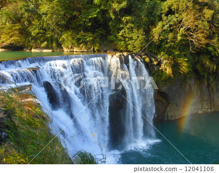Sufficient waterfall and rainbow 12041108