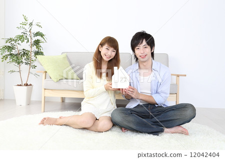 Home and young couple 12042404