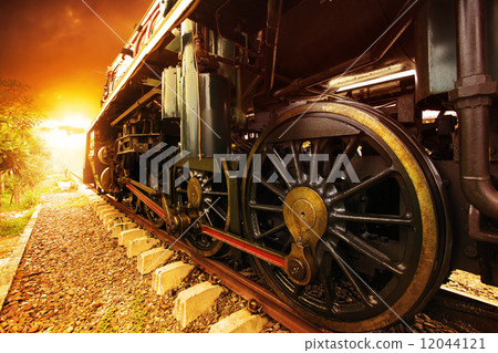 iron wheels of stream engine locomotive train on railways track 12044121
