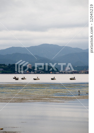 Scenery of freshwater clam fishing on the surface of Lake Shinji Scenery of freshwater clam fishing on the surface of Lake Shinji 12045219