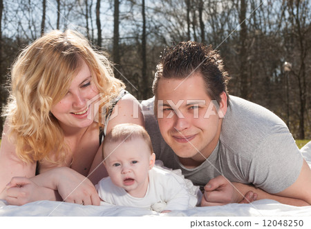 Portrait of a young family Portrait of a young family 12048250