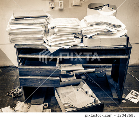 Messy workplace 12048693