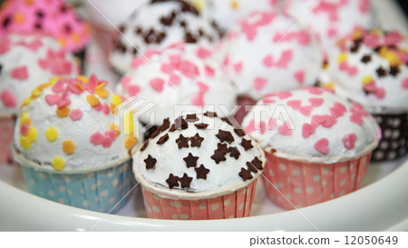 Many Colorful Cup Cakes 12050649