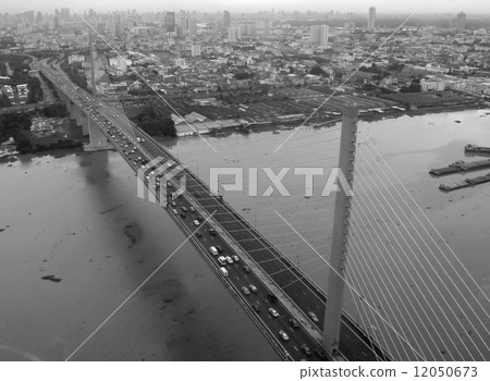Rama9 bridge against Bangkok cityscape 12050673