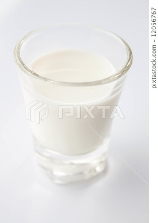 Mini glass of fresh low fat milk 12056767