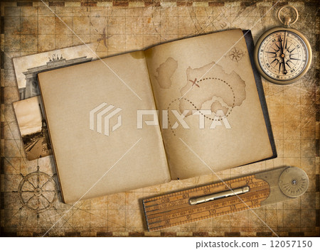 Adventure and travel concept. Vintage map, copybook and compass Adventure and travel concept. Vintage map, copybook and compass 12057150