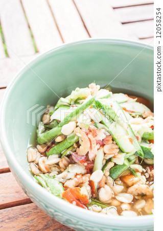 Thai style cucumber spicy salad on the bowl 12058254