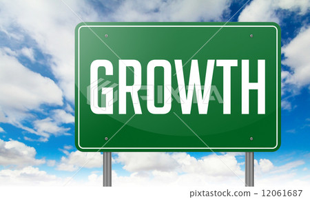 Growth on Green Highway Signpost. 12061687