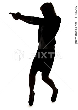 Silhouette of agent woman with handgun 12062072