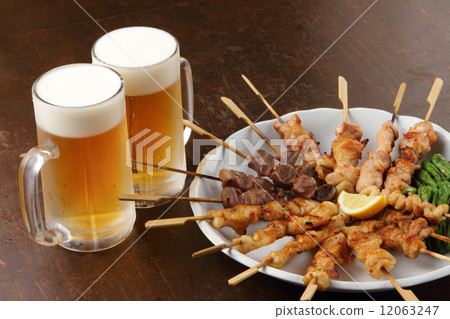 Assortment of yakitori and beer Assortment of yakitori and beer 12063247