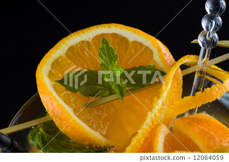 Orange Mojito over dark background 12064059