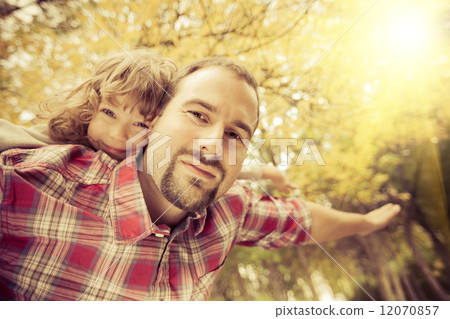 Happy father and child in autumn 12070857