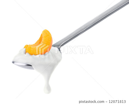 Spoon of peach yogurt 12071813