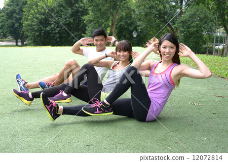 Asian young adults doing exercise Asian young adults doing exercise 12072814