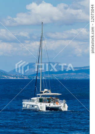 Sailing yacht in the Ionian sea 12073044