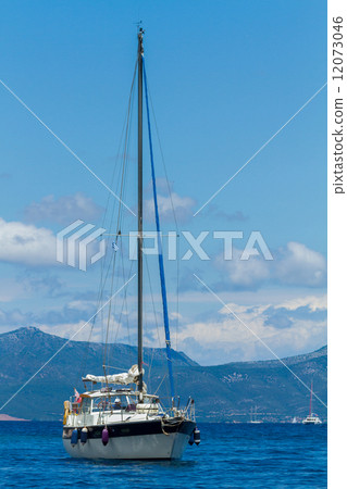 Sailing yacht in the Ionian sea 12073046