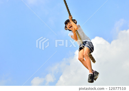 Girls who enjoy playing with park play equipment 12077510