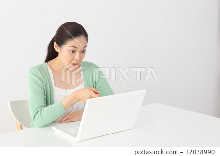 Embarrassed middle-aged woman 12078990