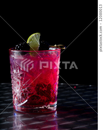 Red cocktail in a whisky glass 12080013