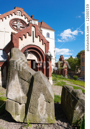 Figure near church 12080539
