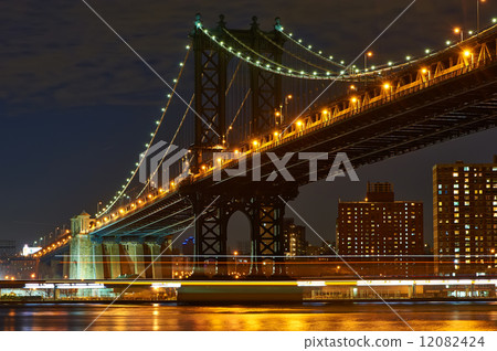 Manhattan Bridge and skyline view from Brooklyn at night 12082424