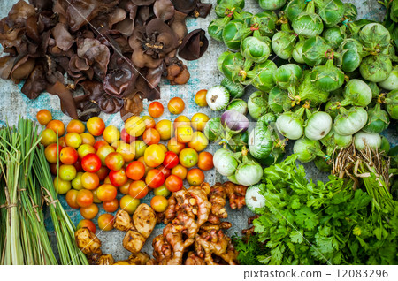 Fresh organic vegetables, herbs and spices at asian market 12083296