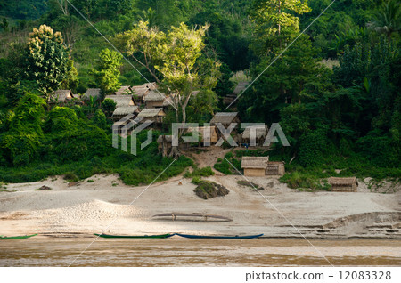 Asian village with traditional wooden house in jungles. Laos 12083328