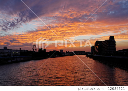 From the Odai bridge overlooking the upper stream of the Sumida River where sunset spreads From the Odai bridge overlooking the upper stream of the Sumida River where sunset spreads 12084321
