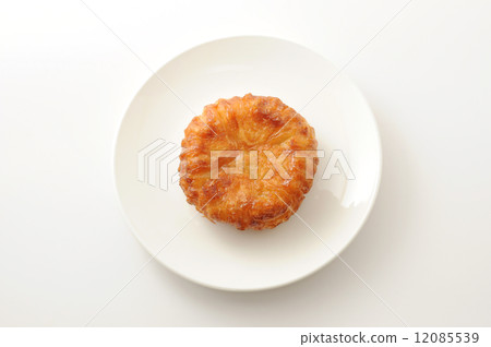Quinny aman put on a plate kouign amann French sweets White background Quinny aman put on a plate kouign amann French sweets White background 12085539