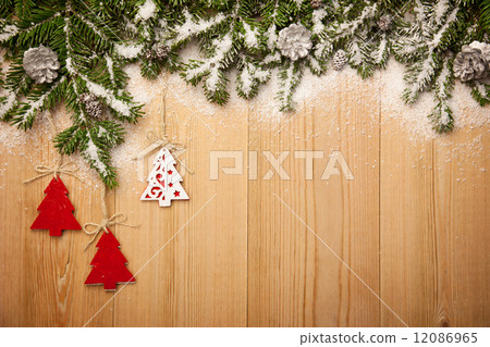 Christmas background with firtree, decorative trees and cones on Christmas background with firtree, decorative trees and cones on 12086965