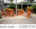 Trees with emotions with flower-beds in the Nong Nooch tropical botanic garden near Pattaya city 12087258