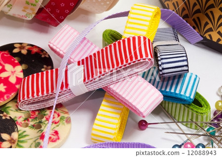 Sewing accessories on a white background Sewing accessories on a white background 12088943