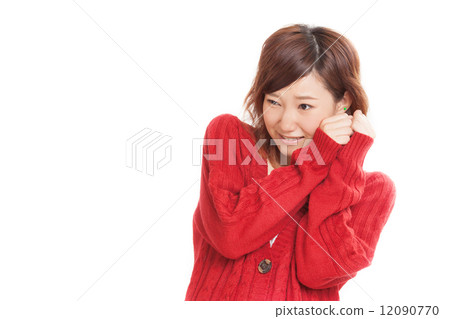 明亮的紅色羊毛衫的一個可愛的女孩 12090770