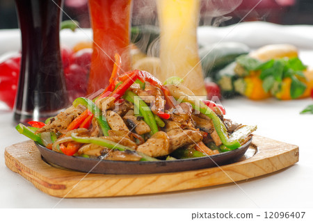 original fajita sizzling hot on iron plate original fajita sizzling hot on iron plate 12096407