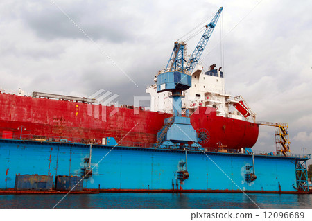 Big red tanker repair in blue floating dock, Varna, Bulgaria 12096689