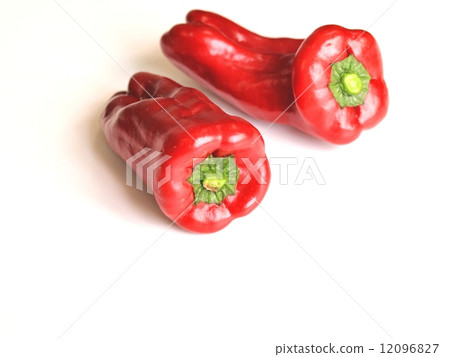 Ripe red bell pepper, 2 pieces, indoor, white background 12096827