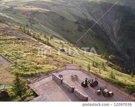 Morning coffee on the terrace of the plateau 12097036