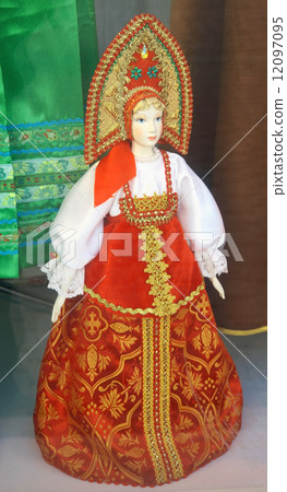 Traditional russian doll in national costumes Traditional russian doll in national costumes 12097095