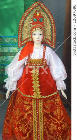 Traditional russian doll in costume Traditional russian doll in costume 12097096