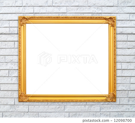 blank golden frame on brick stone wall 12098700