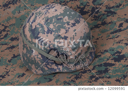 kevlar helmet with dog tags on camouflage cover kevlar helmet with dog tags on camouflage cover 12099591