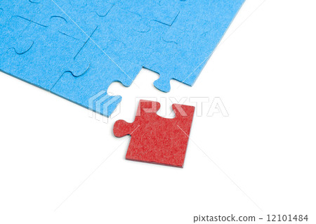 Blue Puzzle with one red jigsaw piece isolated on white backgrou Blue Puzzle with one red jigsaw piece isolated on white backgrou 12101484