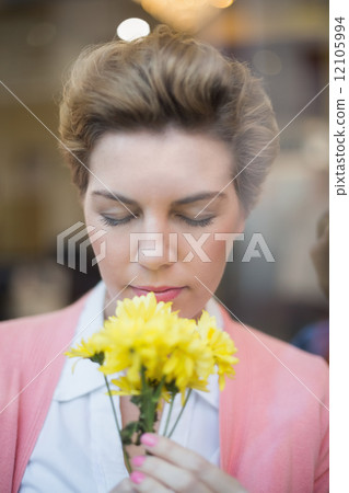 Pretty blonde smelling yellow flowers 12105994