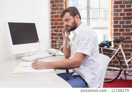 Casual businessman on the phone 12106279