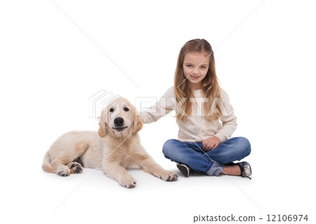 Girl holding her puppy close Girl holding her puppy close 12106974