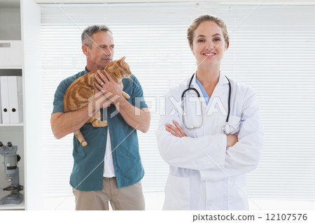 Smiling vet looking at the camera Smiling vet looking at the camera 12107576